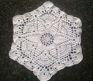 Unusual hexagonal white cotton crochet doilie 28cm