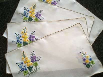 Elegant vintage fine linen hand embroidered placemats x 5