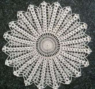 Attractive cream crochet doilie 29cm