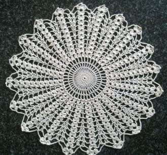 Attractive cream crochet doilie 29cm
