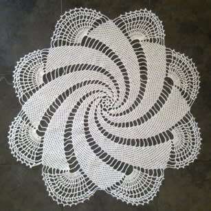 Striking large pinwheel crochet doilie 70cm