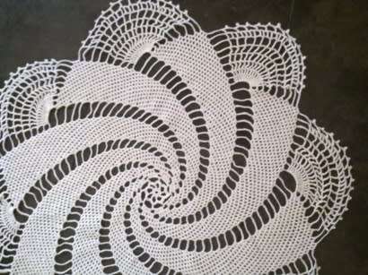 Striking large pinwheel crochet doilie 70cm