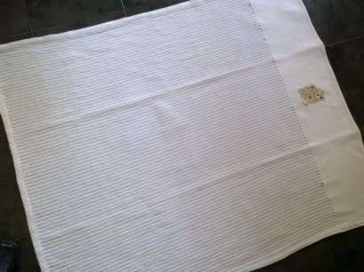 White cotton baby blanket