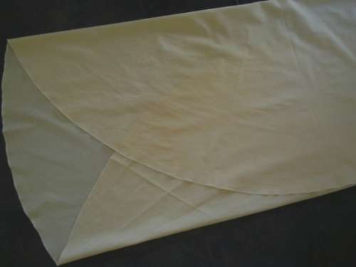 Round pale yellow cotton tablecloth