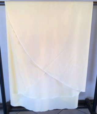 Round pale yellow cotton tablecloth
