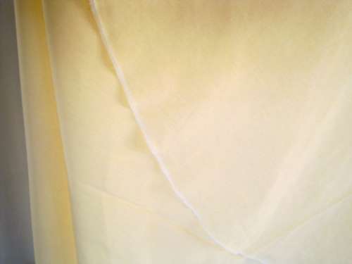 Round pale yellow cotton tablecloth