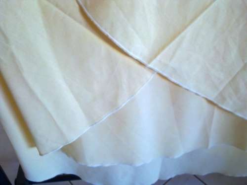 Round pale yellow cotton tablecloth