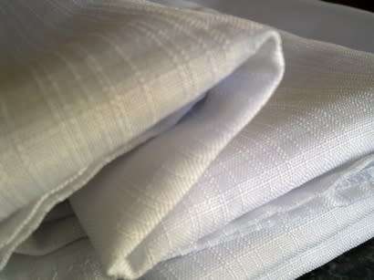 Large plain white polyester tablecloth