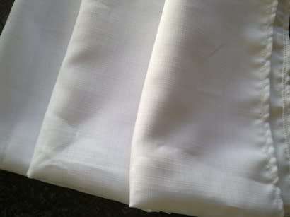 Large plain white polyester tablecloth