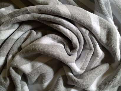 Three large 100% cotton striped bath or beach towels