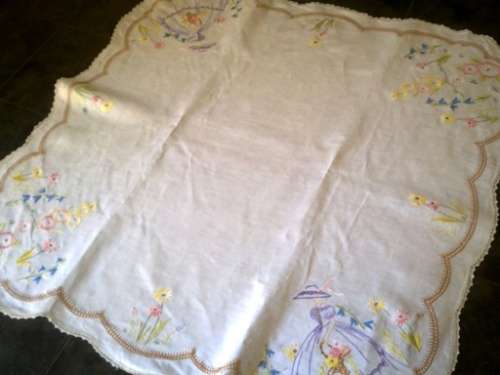 Charming hand embroidered crisp white linen tablecloth