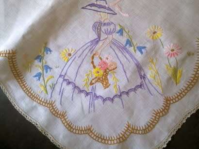 Charming hand embroidered crisp white linen tablecloth