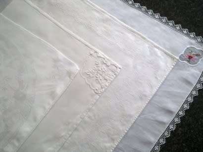 Four beautiful individual white linen dinner serviettes - harlequin set