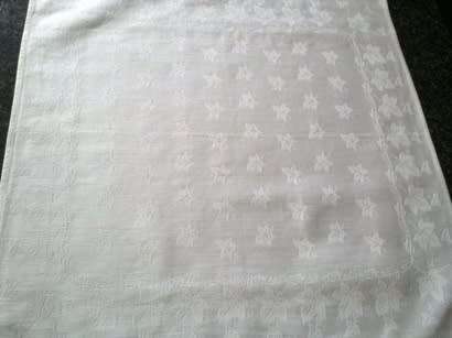 Four beautiful individual white linen dinner serviettes - harlequin set