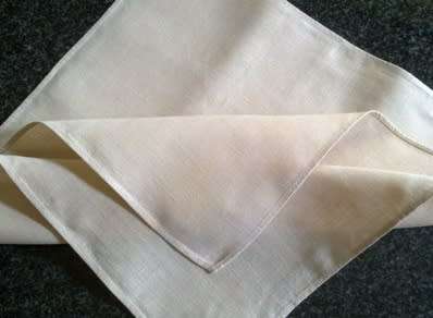 Two large vintage linen dinner serviettes