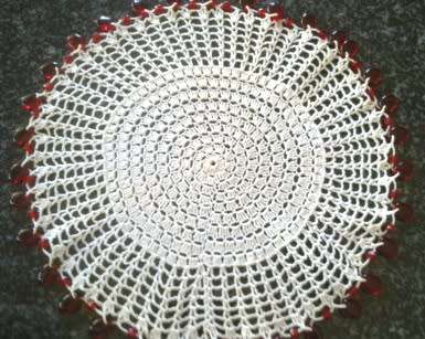 Vintage glass beaded doilie 20cm
