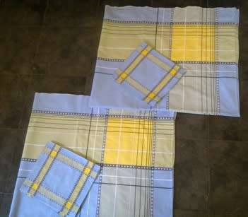 Matching pair of tea tablecloths and 12 napkins