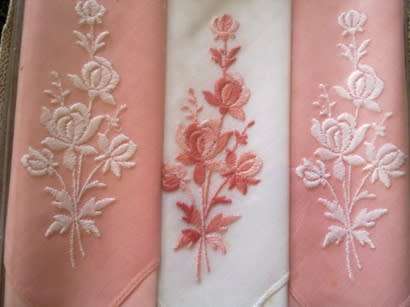 Vintage boxed set of three Swiss hankies and one other