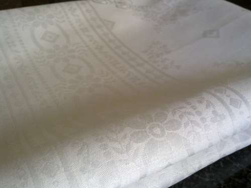 Antique white Irish linen dinner serviette