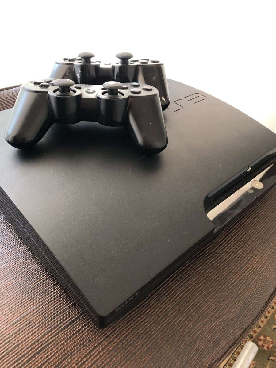 ***Selling as non-functional*** SONY PS3 MODEL CECH-2004B and two ORIGINAL SONY PS3 WIRELESS CONTROL