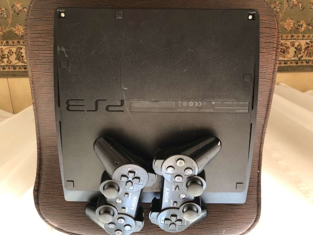 ***Selling as non-functional*** SONY PS3 MODEL CECH-2004B and two ORIGINAL SONY PS3 WIRELESS CONTROL