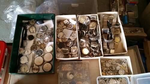 a huge bunch of old watches.