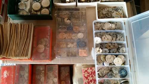 a huge bunch of old watches.