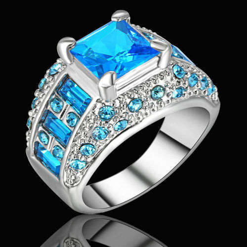 Elegant Rhodium Topaz Rings