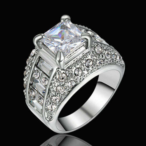 Elegant Rhodium Topaz Rings