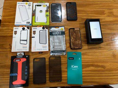 iPhone 7 Plus 128GB Jet Black + 11 Covers + iCare Warranty