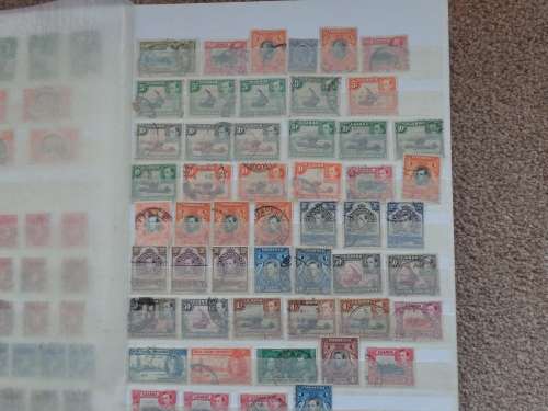 Stamp Album  with over 1000  Mint/Used Mostly  BRITISH Commonwealth and Other World Stamps