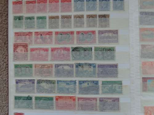 Stamp Album  with over 1000  Mint/Used Mostly  BRITISH Commonwealth and Other World Stamps
