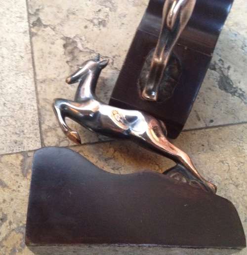 copper and wood springbok vintage bookends
