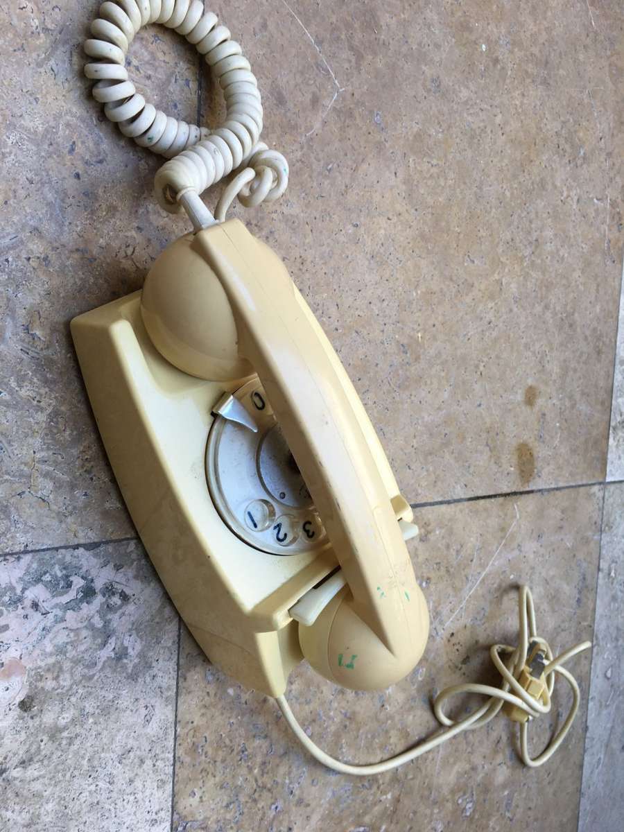 vintage dial up rotary telephone beige