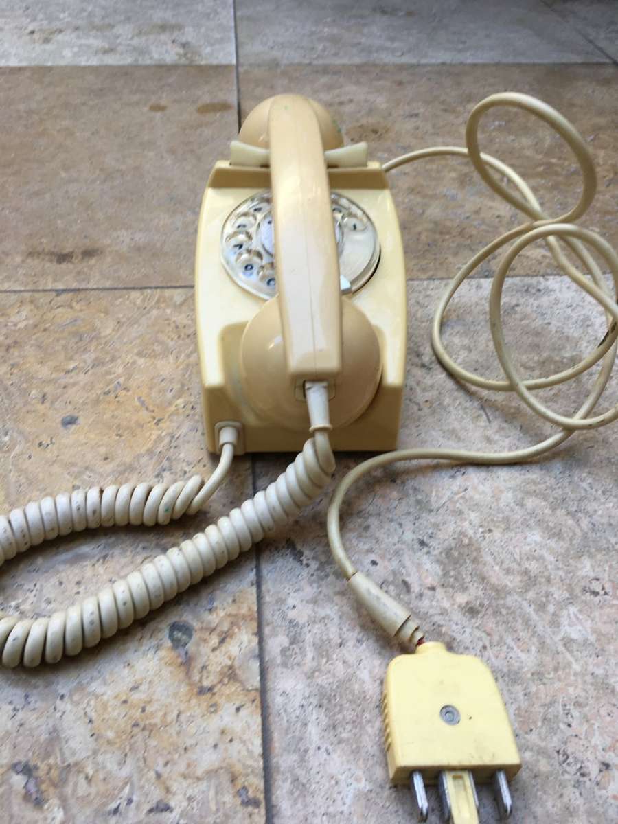 vintage dial up rotary telephone beige