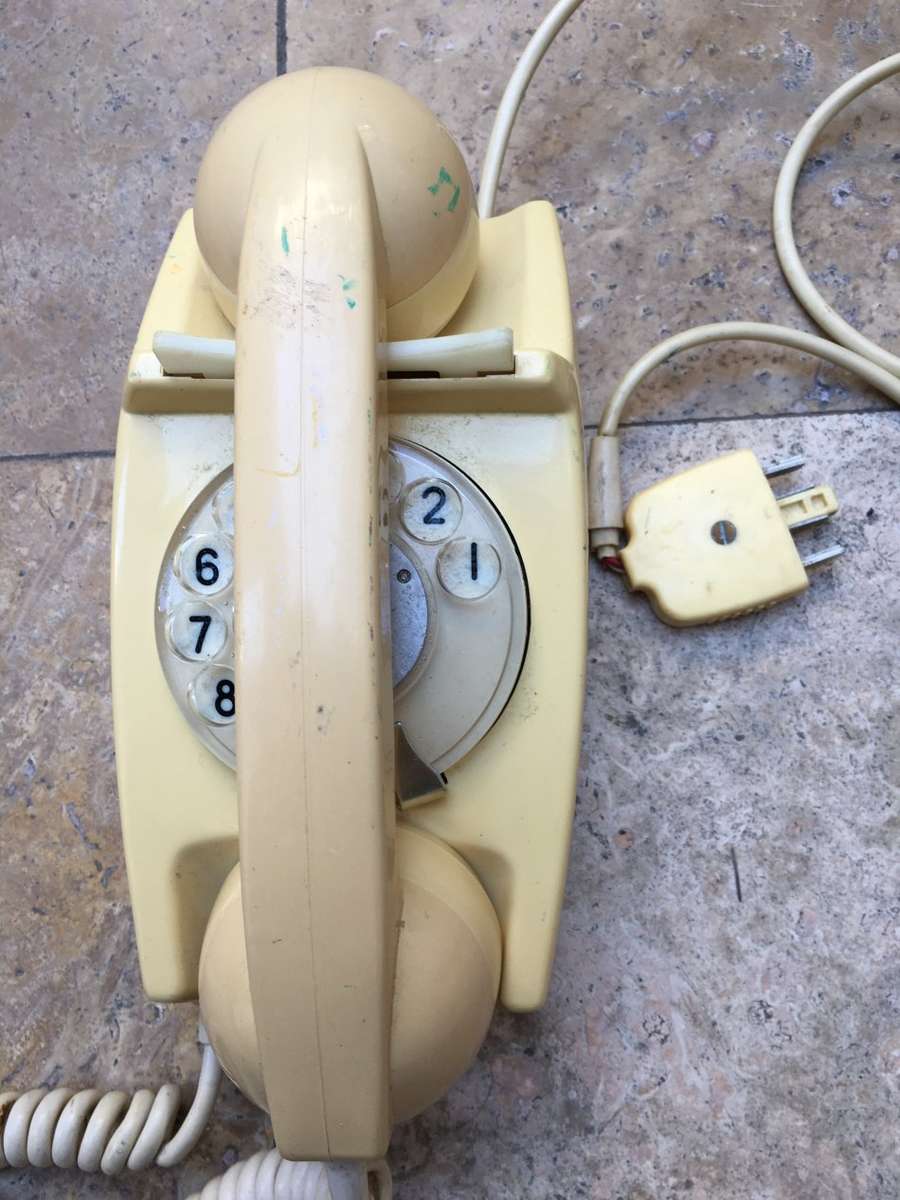 vintage dial up rotary telephone beige