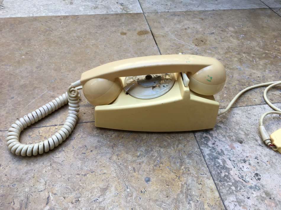 vintage dial up rotary telephone beige