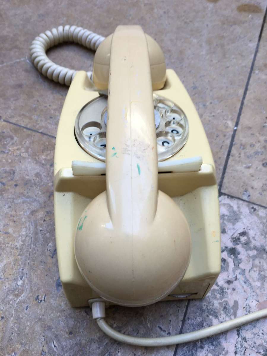 vintage dial up rotary telephone beige