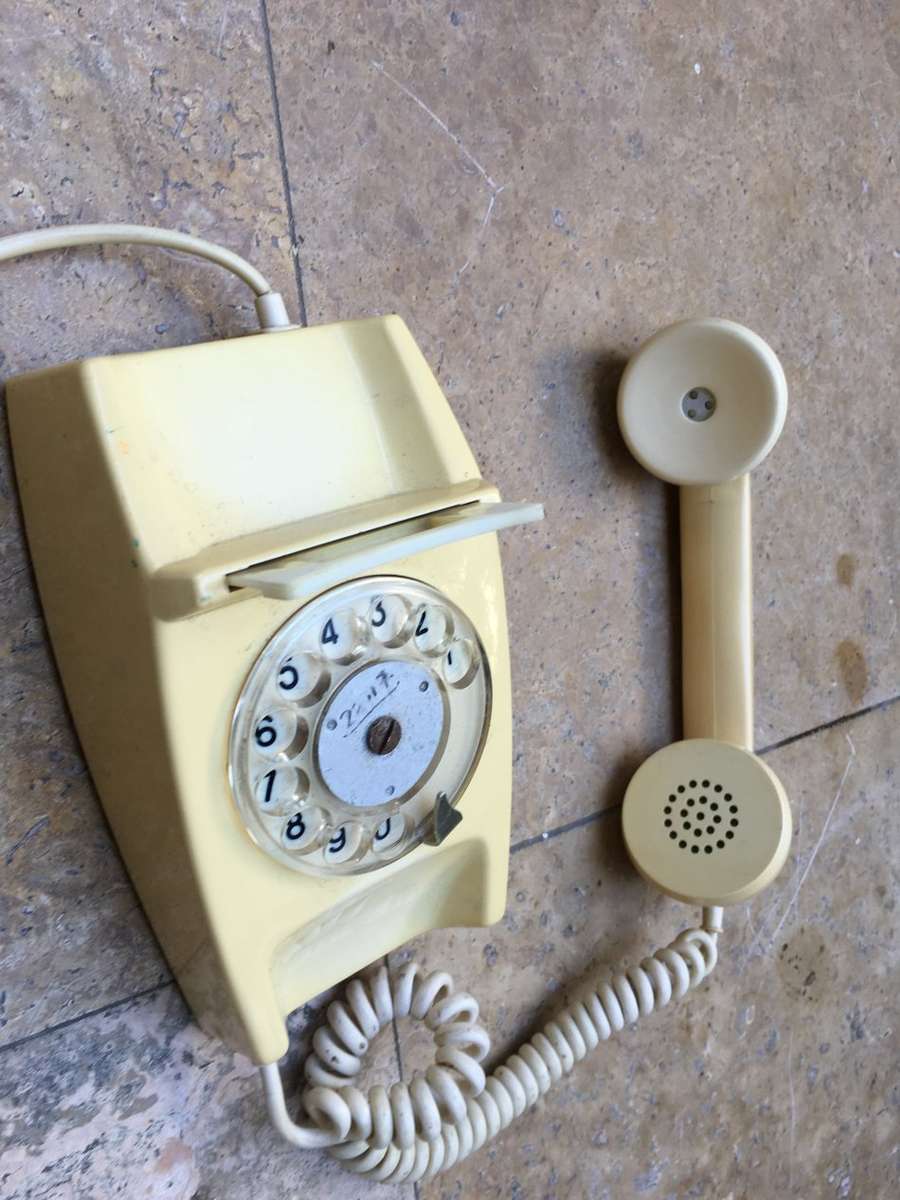 vintage dial up rotary telephone beige
