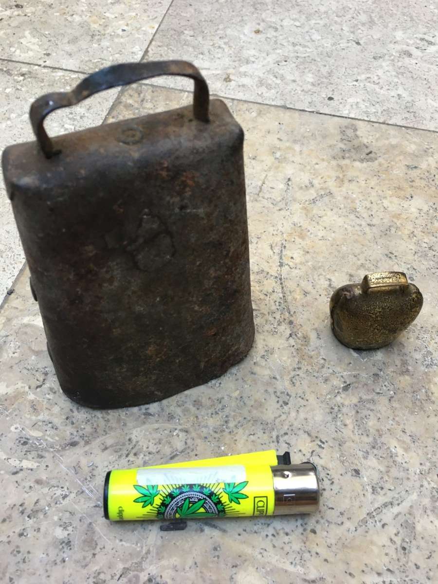 vintage primitive Cow bell , with a small swiss cow bell small