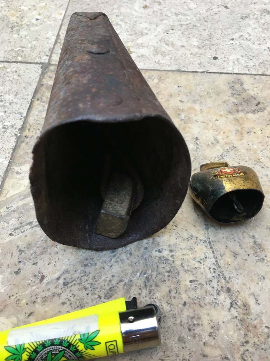 vintage primitive Cow bell , with a small swiss cow bell small