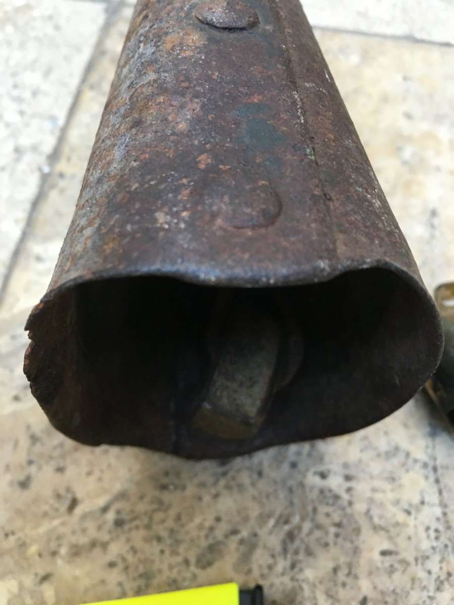 vintage primitive Cow bell , with a small swiss cow bell small