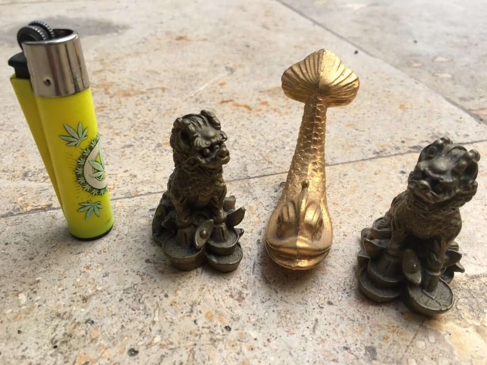 brass foo dog dogs pair with a brass fish