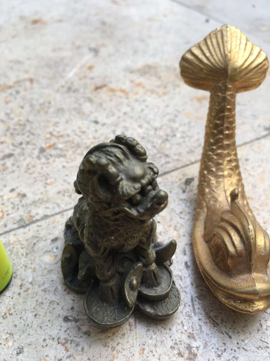 brass foo dog dogs pair with a brass fish