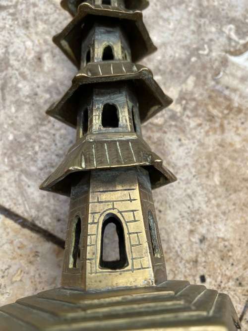 vintage brass pagoda incense holder and pagoda candle stick holder pair