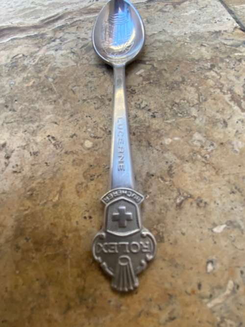 Rolex Bucherer Lucerne spoon with vintage benson and hedges cigarette tin