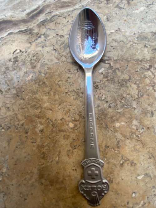Rolex Bucherer Lucerne spoon with vintage benson and hedges cigarette tin