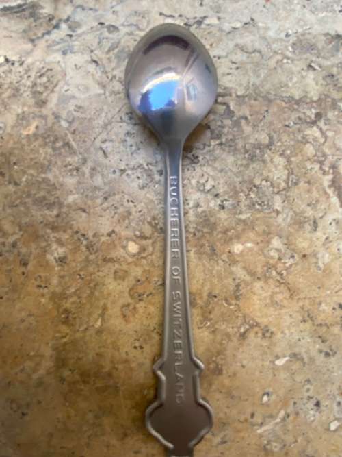 Rolex Bucherer Lucerne spoon with vintage benson and hedges cigarette tin