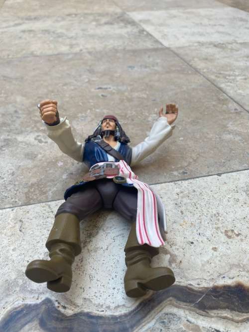 captain jack sparrow Zizzle disney figure in mickey mouse tin