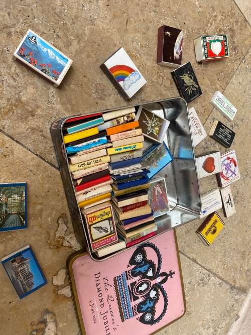 vintage lot of old matches 65 match boxes in metal tin